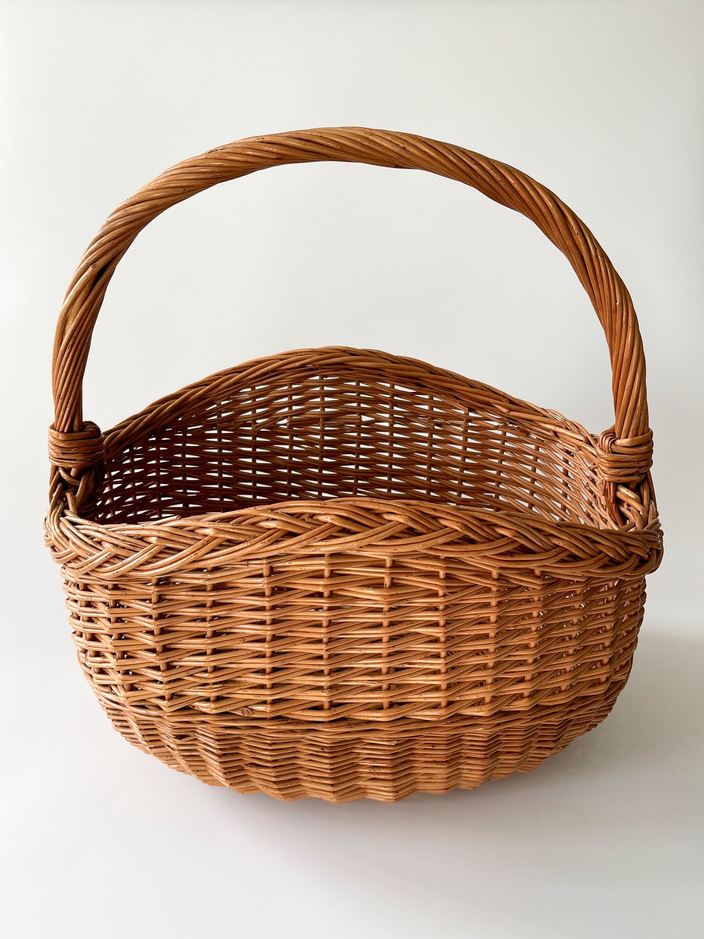 Vintage Handwoven Arched Rim Oval Basket