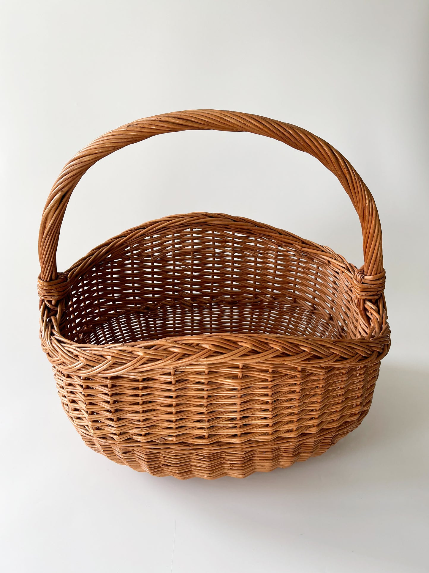 Vintage Handwoven Arched Rim Oval Basket